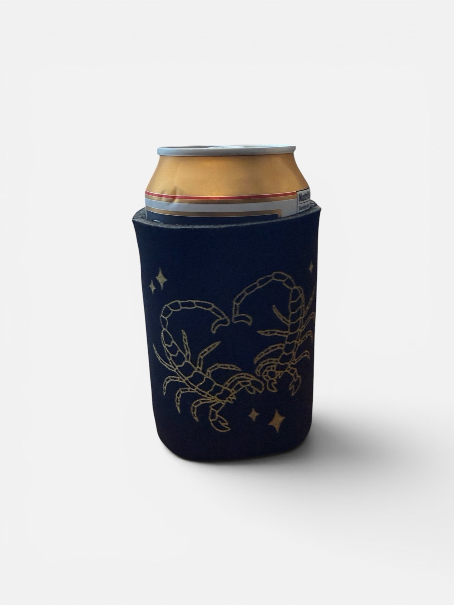 Scorpion Hearts Club black neoprene can cooler with a gold scorpion heart graphic and stars on a 12oz beverage can.